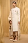 Buy_Tarun Tahiliani_Ivory Textured Fabric Embroidered Paisley Placed Sherwani Set _Online_at_Aza_Fashions