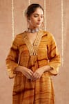 Label Muslin_Yellow Satin Silk Embellished Gota Lace V-neck Sahab Striped Kurta Pant Set _at_Aza_Fashions