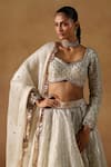 Shop_LASHKARAA_Ivory Organza Embroidered Zari Sweetheart Geometric Sequin Lehenga Set _at_Aza_Fashions