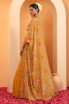 Shop_SWATI WADHWANI COUTURE_Yellow Crepe Embellished Floral Blouse Ruhani Printed Cape With Lehenga Set _at_Aza_Fashions