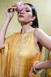 Shop_Sheela Suthar_Yellow Silk Slub Satin Embroidery Lotus Zardosi Asymmetric Kurta And Pant Set _Online_at_Aza_Fashions