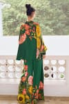 Shop_Limerick by Abirr N' Nanki_Green Crepe Printed Floral Flared Pant _at_Aza_Fashions