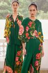 Limerick by Abirr N' Nanki_Green Crepe Printed Floral Flared Pant _at_Aza_Fashions