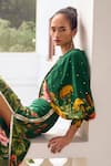 Limerick by Abirr N' Nanki_Emerald Green Crepe Printed Floral Round Celine Draped Jumpsuit _Online_at_Aza_Fashions