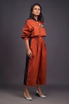 Shop_Deepika Arora_Orange 100% Cotton Badge Mandarin Collar Color Block Jumpsuit _Online_at_Aza_Fashions