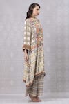 Shop_Niki Mahajan_Beige Crepe Printed Vintage Floral Round Abstract Kurta With Pant _at_Aza_Fashions