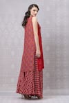 Shop_Niki Mahajan_Red Crepe Embroidery Round Neck Floral Lace Work Kurta With Pant _at_Aza_Fashions
