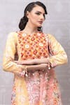 Niki Mahajan_Orange Crepe Handblock Printed Vintage Beads Embroidered A-line Kurta With Pant _at_Aza_Fashions