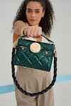 Buy_WAGON HORSE_Green Amore Leo Metal Logo Embellished Bag _at_Aza_Fashions