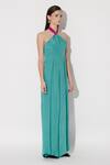 Twinkle Hanspal_Green Crepe Halter Julia Shirred Back Jumpsuit _Online_at_Aza_Fashions