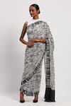 Abraham & Thakore_Ivory Satin Printed Broken Lines Sequin Embroidered Saree _Online_at_Aza_Fashions