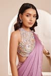 Dheeru Taneja_Purple Raw Silk Embroidered Cutdana Halter Summaya Pre-draped Saree With Blouse _at_Aza_Fashions