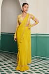 Buy_Dheeru Taneja_Yellow Georgette Print Kesar Ruffle Embroidered Pre-draped Saree With Blouse _at_Aza_Fashions