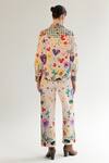 Shop_NOIB_Multi Color Cotton Twill Printed Garden Of Eden Celia Pant _at_Aza_Fashions