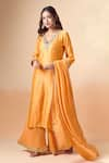 Shop_Kalakaari By Sagarika_Orange Chanderi Silk Hand Embroidery Floral V Neck Kurta Palazzo Set _Online_at_Aza_Fashions