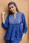 Buy_Ayaka_Blue Viscose Tabby Hand Embroidery Floral Notched Cara Bandhani Thread Yoke Top _at_Aza_Fashions