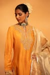 SWATI WADHWANI COUTURE_Yellow Chanderi Embellished Zari Notched Round Shaan Paisley Kurta Set _at_Aza_Fashions