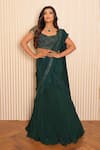 Buy_VRIDHI SOMAANI_Green Crepe Hand Embroidered Tassel Ivy Pre-draped Lehenga Saree With Blouse _at_Aza_Fashions