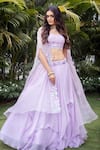 Buy_VRIDHI SOMAANI_Purple Organza Embroidered Floral Blouse Viola Layered Lehenga Set With Jacket _at_Aza_Fashions