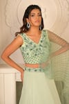 VRIDHI SOMAANI_Green Organza Embroidered Floral Castelle Ruffle Lehenga Saree And Blouse Set _Online_at_Aza_Fashions