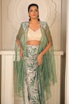 VRIDHI SOMAANI_Green Silk Crepe Printed Tropical Blouse V-neck Zia Draped Skirt And Cape Set _Online_at_Aza_Fashions