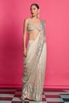 Priyanka Jain_Gold Georgette Embroidered Sequin Sweetheart Pre-draped Saree With Blouse _Online_at_Aza_Fashions