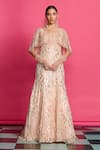 Buy_Priyanka Jain_Peach Georgette Embroidered Sequin Plunge-v Shimmer Gown _at_Aza_Fashions