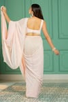 Shop_Monk & Mei_Pink Georgette Embellished Pearl Scoop Neck Border Pre-draped Saree With Blouse _at_Aza_Fashions