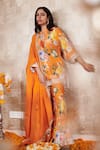 Shop_Rainas_Orange Cotton Silk Printed Floral Tie-up Pattern Kurta Sharara Set _at_Aza_Fashions