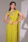 BAANI KHURANA_Green Satin Embroidered Applique Floral Embellished Corset Pre-draped Saree Set _at_Aza_Fashions