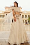 Nikita Vishakha_Ivory Blouse Net Hand Embroidery Pearl Cape Round Floral Flare Lehenga Set _Online_at_Aza_Fashions