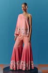 Pooja Rajgarhia Gupta_Peach Silk Satin Hand Embroidered Twilight Asymmetric Top With Bell Bottom Pant _Online_at_Aza_Fashions