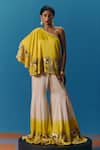 Shop_Pooja Rajgarhia Gupta_Yellow Silk Satin Hand Embroidered Sunlit Asymmetric Top With Bell Bottom Pant _Online_at_Aza_Fashions