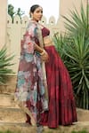 Shop_Monk & Mei_Maroon Georgette Embellished Floral Cape Open Aafia Print Tiered Lehenga Set _Online_at_Aza_Fashions