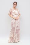 Buy_Tarun Tahiliani_Pink Foil Jersey Printed Geometric Overlapping V Neck Pattern Flared Jumpsuit _at_Aza_Fashions