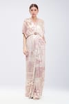 Tarun Tahiliani_Pink Foil Jersey Printed Geometric Overlapping V Neck Pattern Flared Jumpsuit _Online_at_Aza_Fashions