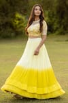 Shop_ISLIE BY PRIYA JAIN_Yellow Organza Embroidered Thread Ombre Pleated Lehenga With Floral Blouse _at_Aza_Fashions