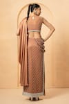 Shop_Quench A Thirst_Beige Georgette Embellished Crystal Cutdana Pre-stitched Saree With Blouse _at_Aza_Fashions