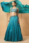 Quench A Thirst_Blue Modal Satin Embellished Mirror Round Neck Work Lehenga Blouse Set _at_Aza_Fashions