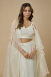 Shop_EWOKE_Ivory Crepe Embellished Bead Waistband Lehenga With Cape Sleeve Blouse _at_Aza_Fashions