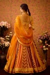 Shyam Narayan Prasad_Yellow Viscose Silk Brocade Woven Floral Round Neck Yam Tunic And Lehenga Set _Online_at_Aza_Fashions