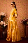 Shyam Narayan Prasad_Gold Viscose Silk Brocade Applique Floral Round Neck Bloom Tunic And Lehenga Set _at_Aza_Fashions