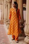 Buy_Megha Pitti_Orange Dupion Silk Print Lotus Sequin Boat Motif Embellished Kurta With Pant _at_Aza_Fashions