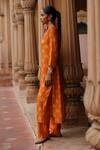 Buy_Megha Pitti_Orange Dupion Silk Print Lotus Sequin Boat Motif Embellished Kurta With Pant _Online_at_Aza_Fashions