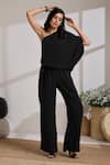 Vasstram_Black Crepe Solid One Shoulder Draped Jumpsuit _at_Aza_Fashions