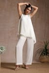 Shop_Vasstram_Off White Crepe Solid Round Layered Jumpsuit _Online_at_Aza_Fashions