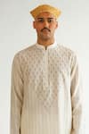 Buy_WABI SABI BY ANSHUM-RITESH_Ivory Chanderi Embroidery Dori Asterisk Kurta With Pyjama _Online_at_Aza_Fashions