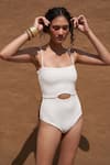 Buy_Shop Nirvanaa_White Recycled Italian Fabric High Eza Cut-out Front Monokini _Online_at_Aza_Fashions