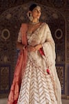 Buy_Nitika Gujral_Ivory Organza Embroidery Dabka Sweetheart Neck Chevron Bridal Lehenga Set _Online_at_Aza_Fashions