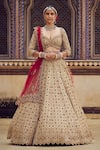 Buy_Nitika Gujral_Gold Tissue Embroidery Dori Sweetheart Neck Stone Bridal Lehenga Set _at_Aza_Fashions